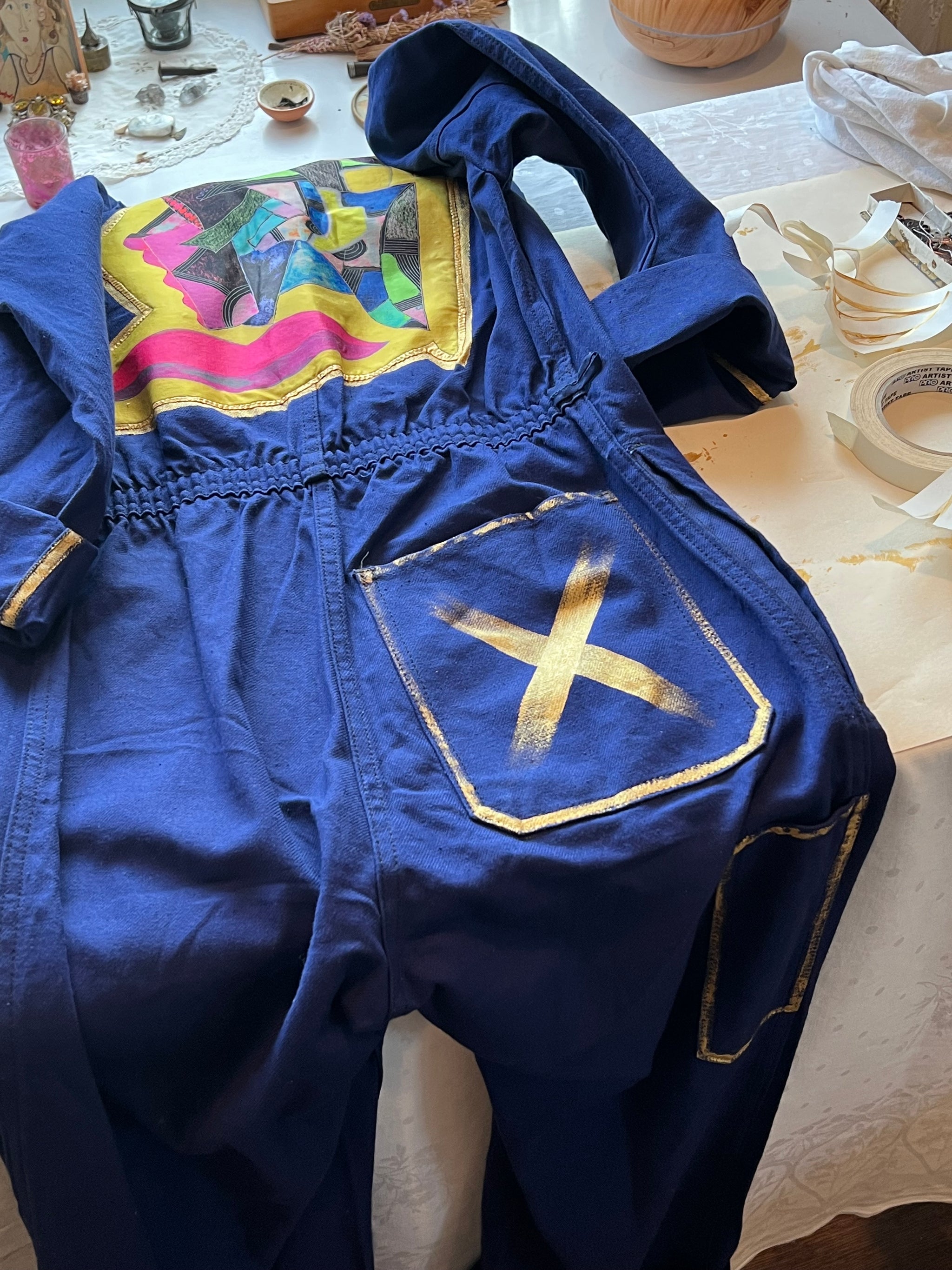 Kinney in Blue Jumpsuit Judith Bodart Beylerian - Main Image